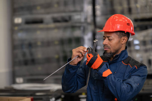 istock African American worker during product inspection in production 1715860263