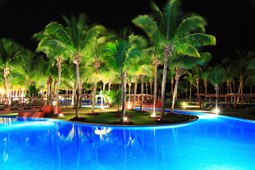 Night view of luxury hotel swimming pool in Yucatan, Mexico