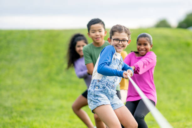 istock Children's Tug-of-War Game 1715861796