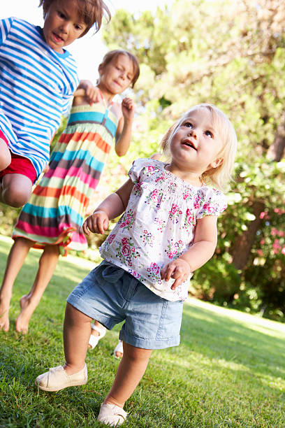 istock Group Of Children Playing In Garden 171586313