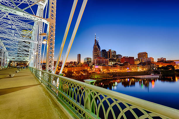 Shelby Street Bridge and the Nashville skyline reflected in the Cumberland river.More images from Nashville in the lightbox: