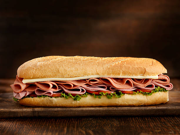 pizza sous mètres de long - sandwich submarine sandwich ham bun photos et images de collection