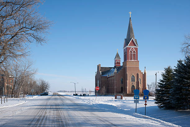 istock Highway Passing through Remote Rural Town  with Large Church 171586805