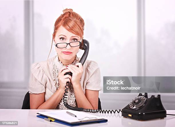 Bored Office Worker On The Phone Stock Photo - Download Image Now - Telephone, Old-fashioned, One Woman Only