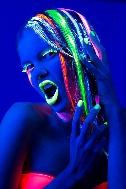 istock Screaming Women Portrait with Glowing Multi Colored Hair 171587032