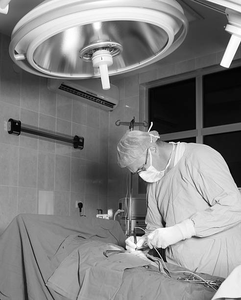 外科手術 - gauze scalpel surgeon healthcare and medicine ストックフォトと画像