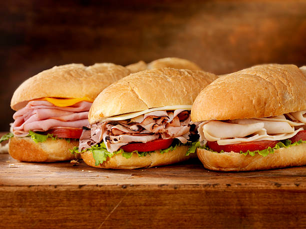 drei meter lange abonnements - sandwich turkey gourmet fast food stock-fotos und bilder