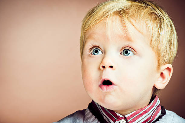 Studio portrait of happy baby boy
