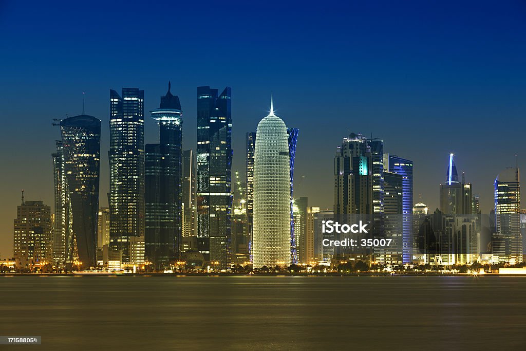 doha bay district skyline doha bay district futuristic skyline at night. Qatar Stock Photo