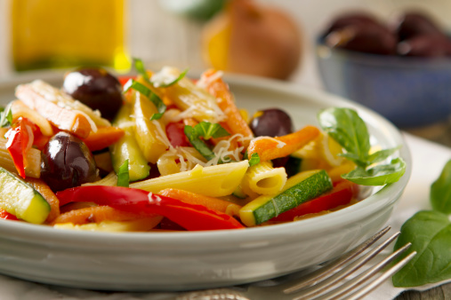 Pasta primavera made with garden fresh carrots, zucchini, and bell peppers. Served with rigatoni and topped with kalamata olives, basil, and grated parmesan cheese.