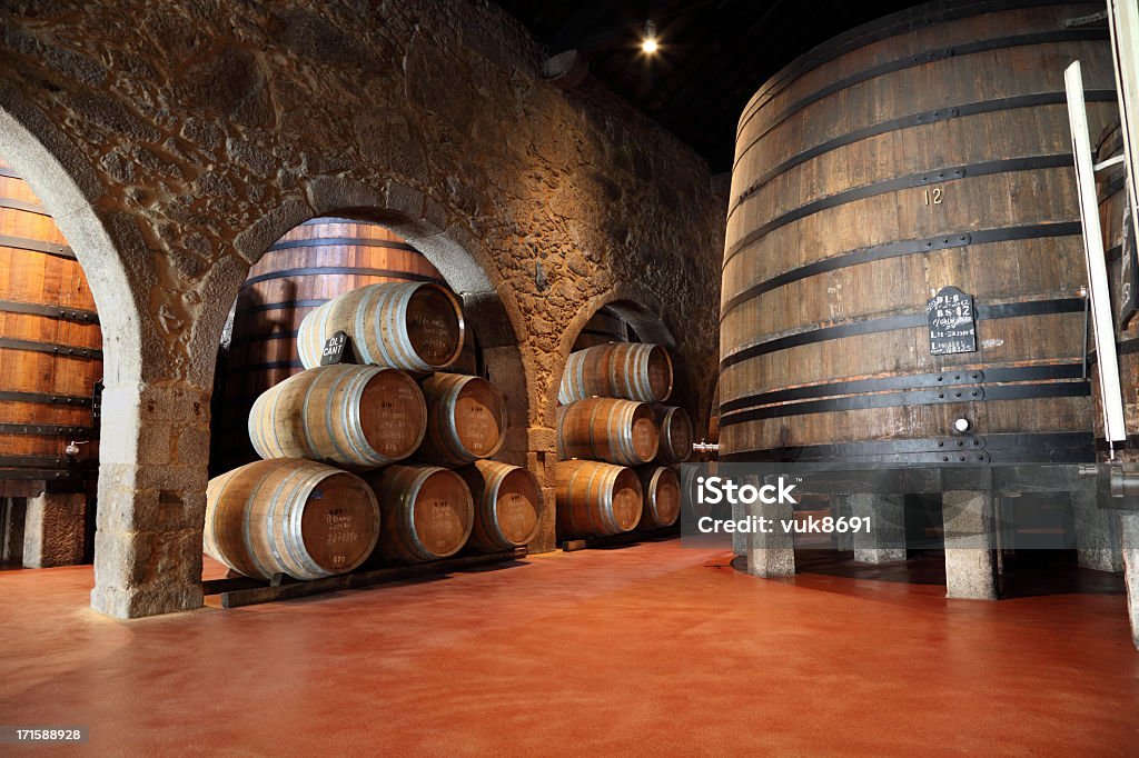 Porto wine cellar Old fashioned Porto wine cellar with wooden barrels in Porto, Portugal Porto - Portugal Stock Photo