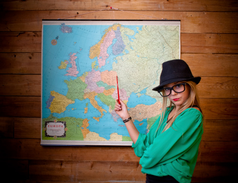 Young girl in front of a map