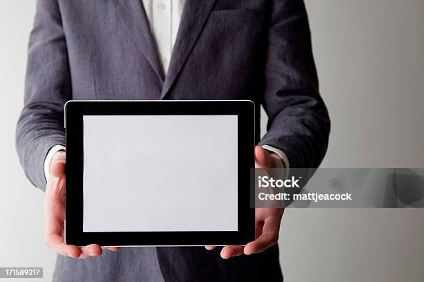 A Business Man Showing A Computer Screen Stock Photo - Download Image Now - Adult, Adults Only, Business
