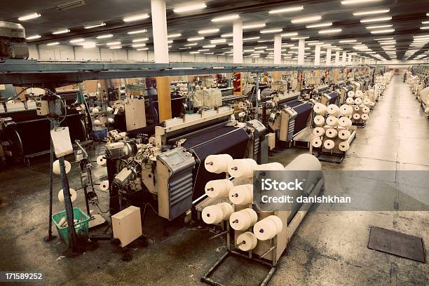 Denim Textile Industry Weaving Jeans Fabric On Airjet Looms Stock Photo - Download Image Now
