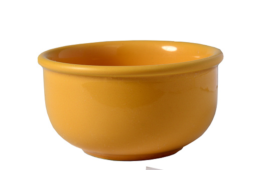 yellow porcelain vessel pot for food soup or broth isolated on white background image