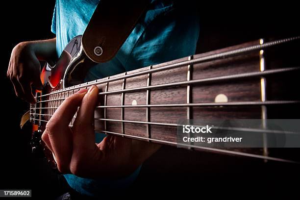 Bass Guitar Player Stock Photo - Download Image Now - Bass Guitar, Close-up, Playing