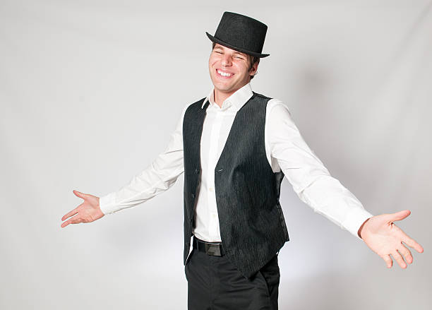 Smiling Young Caucasian Man with Arms Open in Top Hat