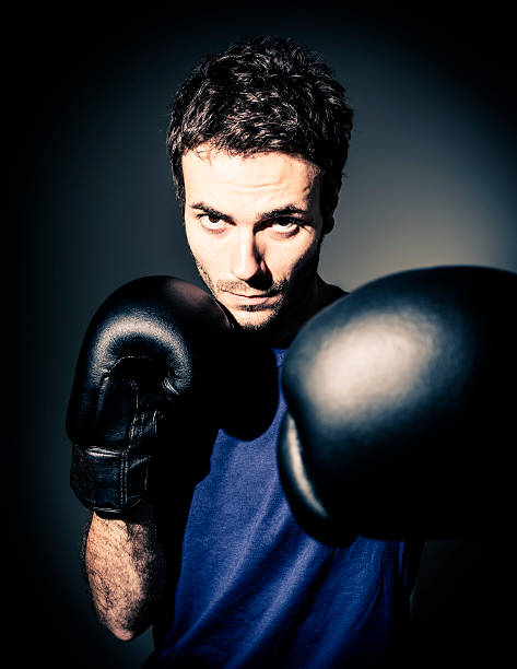 istock Male boxer punching 171589790