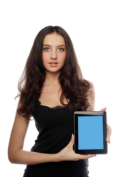 istock Cute teenager presenting a tablet 171590647
