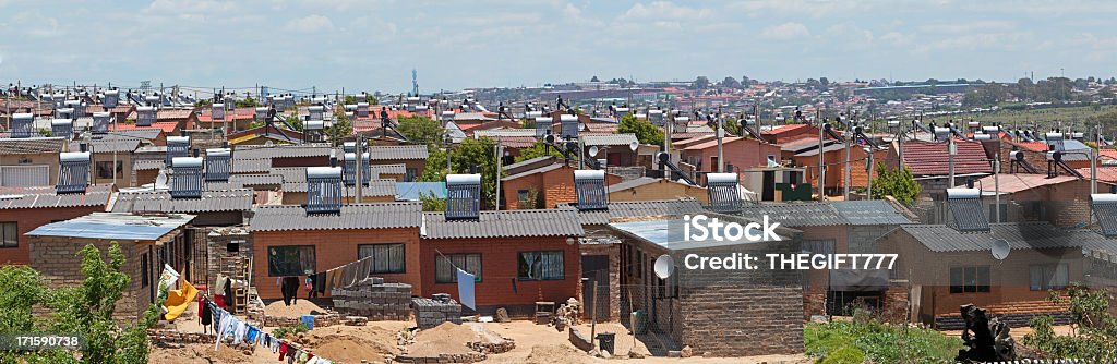 Solar Power in low cost homes Alexander Township in Johannesburg, South Africa, showing new low cost homes fitted with Solar Power for hot water geysers. Solar Panel Stock Photo