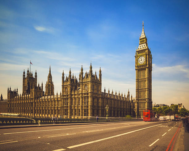 Big Ben and Houses of Parliament the Westminster Bridge with Big Ben and the Houses of Parliament on the background  houses of parliament london stock pictures, royalty-free photos & images
