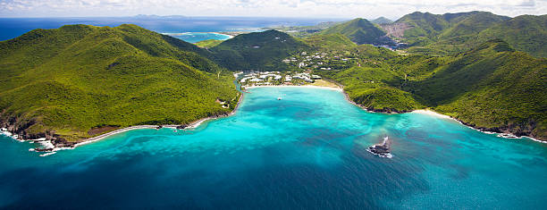 aerial view of marina and resort in St.Martin aerial view of a marina and a resort in Anse Marcel, St.Martin, French West Indies saint martin caribbean stock pictures, royalty-free photos & images