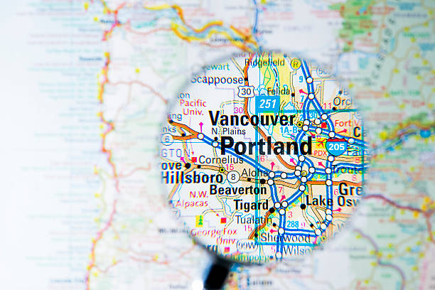 Cities under magnifying glass on map: Portland Cities under magnifying glass on map: Portland oregon us state photos stock pictures, royalty-free photos & images
