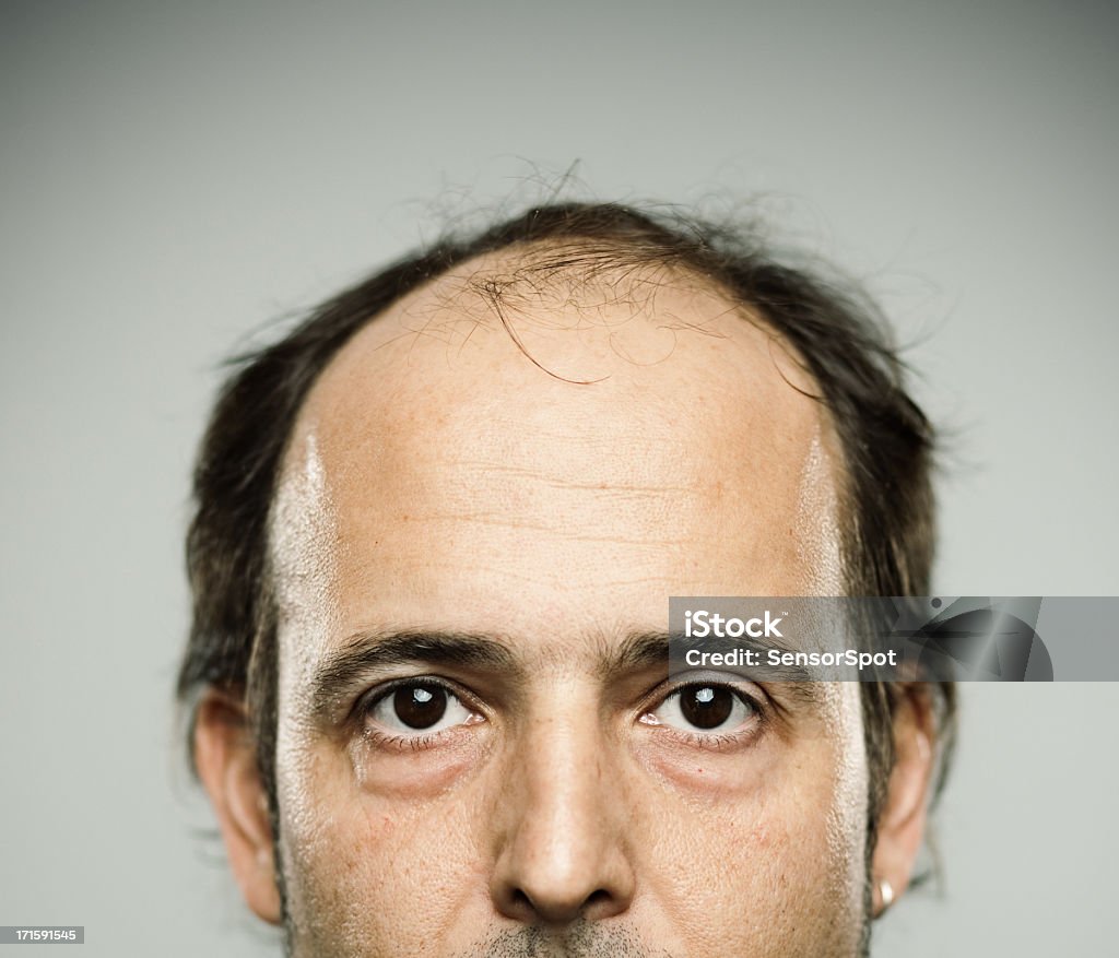 Real man. Portrait of a real man. Hispanic. Half face Balding Stock Photo