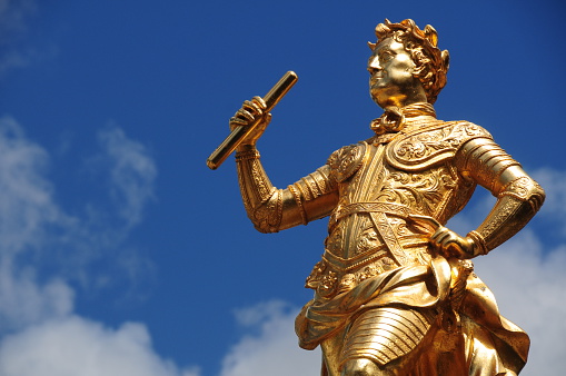 Telephoto image of statue of George II erected in 1751 and re-gilted in pure gold recently. Standing high above Jersey's main seat of government public square.  