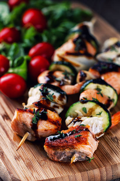istock Fish skewers with salad 171592196