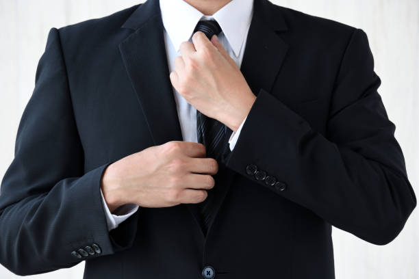 istock Business man wearing tie with no face 1715941182