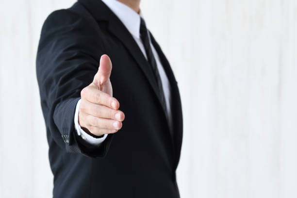 istock Business man putting hand forward to shake 1715941689