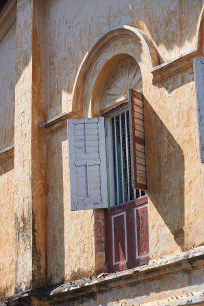 vintage wooden louvred shutters. chinese peranakan house in george town. - louvred imagens e fotografias de stock