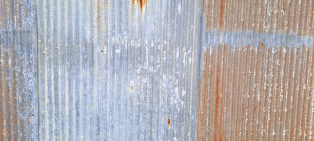 istock Old zinc wall texture background, Texture of rusty galvanized metal roof sheets 1716044573