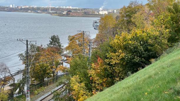 istock Walk along the embankment in autumn 1716074699