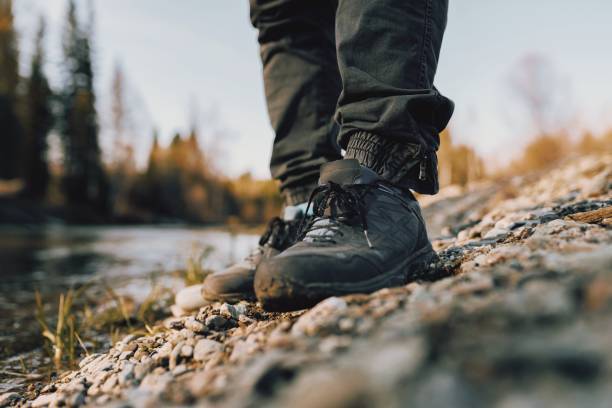 istock Hiking boots close up, in autumn 1716087671