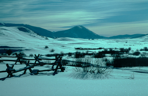 River Loisach flows into the Kochelsee, winter with rime and snow on the trees