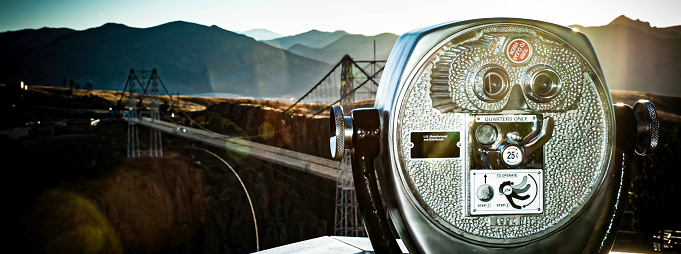 Royal Gorge, view of valley and bridge with view finder in foreground.
