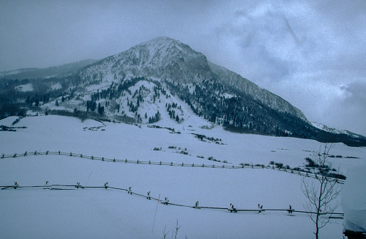 Founded in 1878, Crested Butte is a former coal-mining town turned ski resort nestled in the Elk Mountains of northern Gunnison County. The town lies about twenty-eight miles north of the county seat of Gunnison and about the same distance south of Aspen.