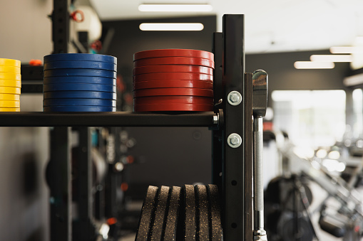 Stacks of coloured weights at the gym
