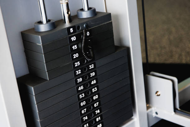 Set of weights in the gym on pulldown machine