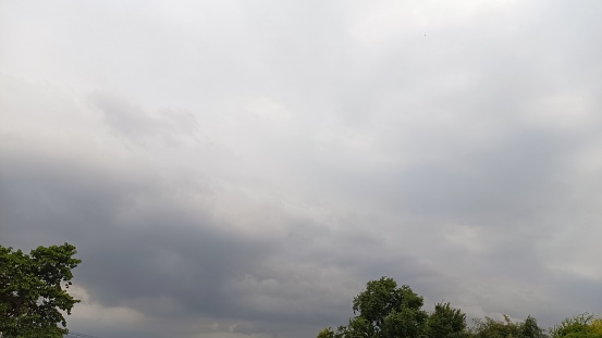 The sky in the countryside where clouds begin to form before a storm.