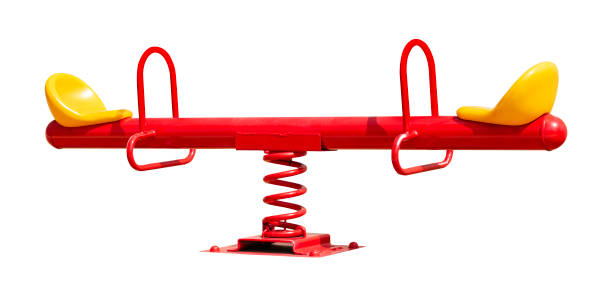 Red seesaw isolated on white background with clipping path
