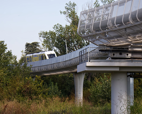 Bologna - Italy - September 2, 2023: Elevated electric monorail People Mover, Marconi Express. Connecting Marconi Airport with Bologna Railway Station.