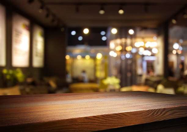 istock Wooden table in the room restaurant background concept for advertising. 1716258593