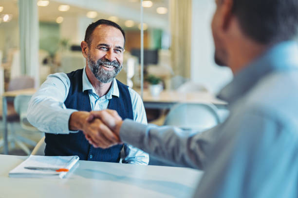 istock Handshake with the new business partner 1716269279