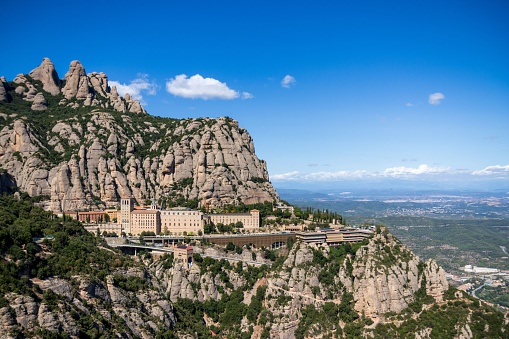 A scenic view of Santa Maria de Montserrat Abbey in Catalonia, Spain