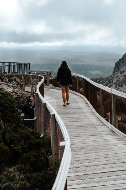 istock Woman walking along a pathway 1716311188