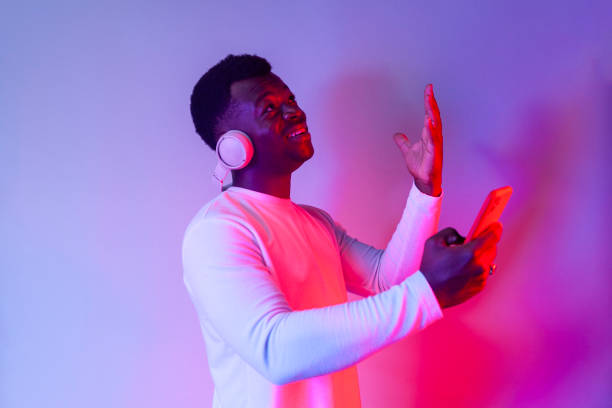 istock Dj plays music from phone 1716326171