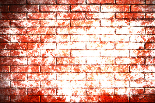 Horizontal illustration of a faded rust coloured illuminated brick wall with rectangular blocks in a textured grungy backgrounds. The wall is rough, uneven, messy with splattered bleached effect, no text and no people.